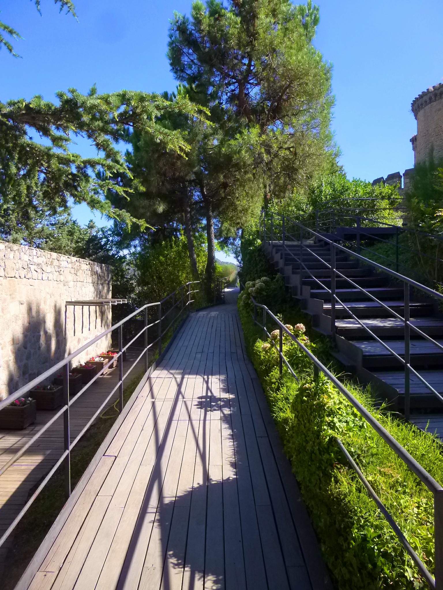 An elegant Gothic gallery runs along the upper courtyard, admired as the finest of its kind.