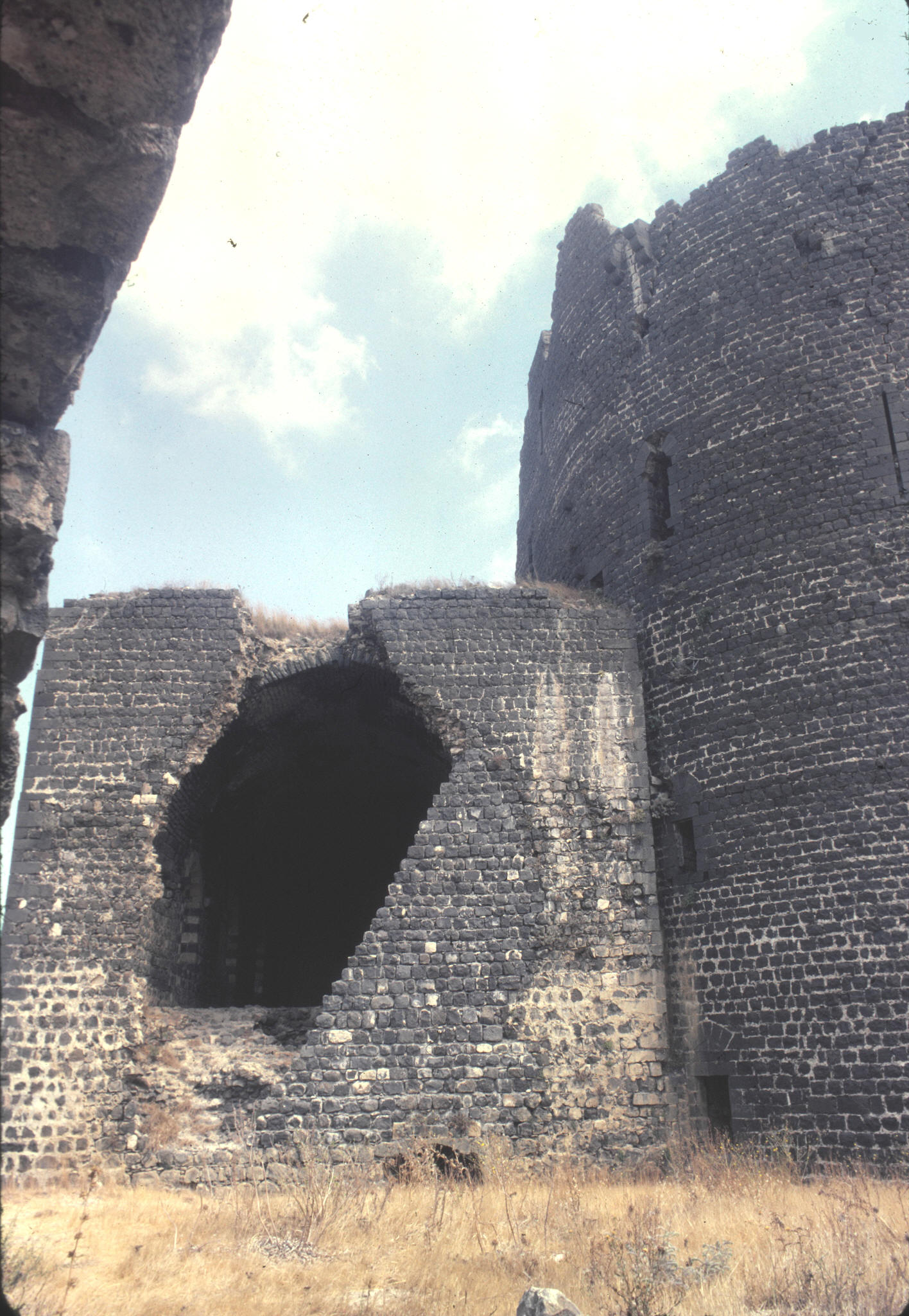 The castle is built from the black basalt of the extinct volcano on which it stands.