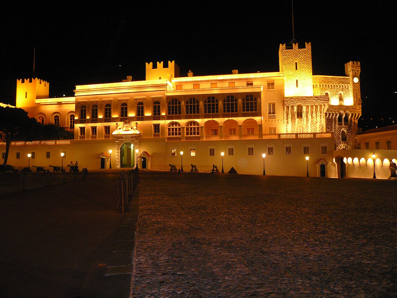 The palace illuminated at night.