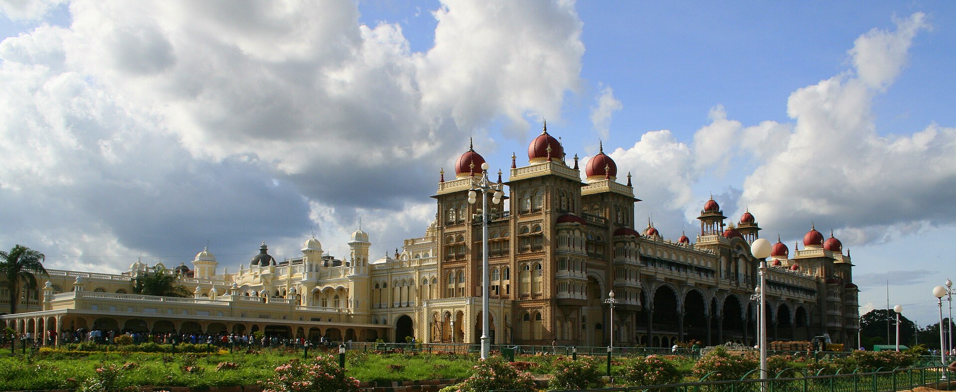 The palace seen in full, a vast composition of arches, columns, domes, and turrets.