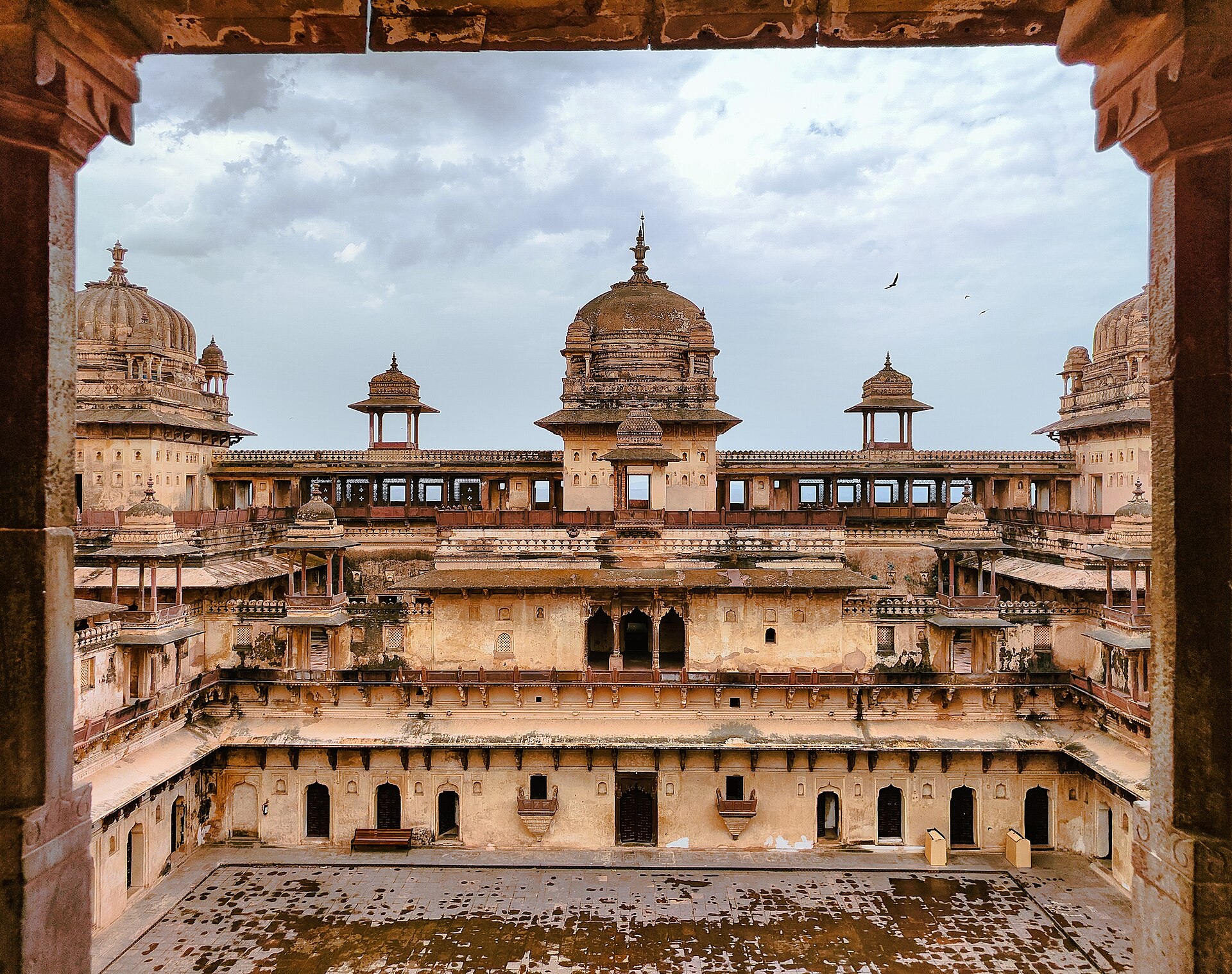 The palace of Orchha rising above the Betwa valley in the monsoon