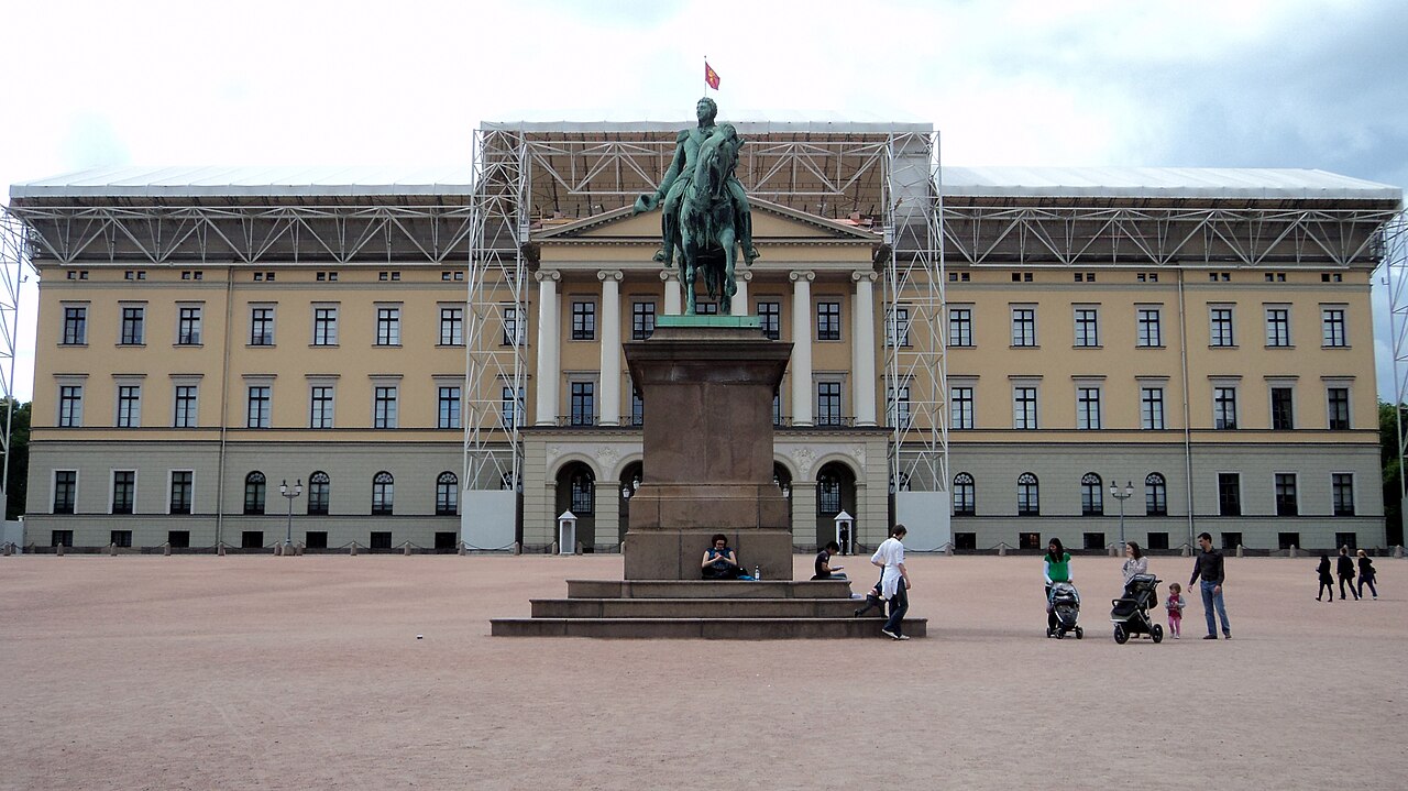 A view of the long, balanced front of the Royal Palace.