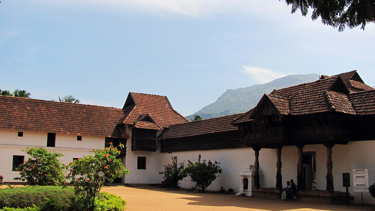 A view of the wooden palace complex and its tiled roofs.
