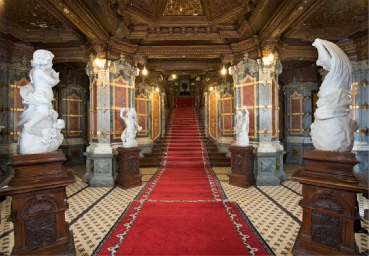 A richly decorated interior of Peles Castle.