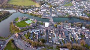 Pembroke Castle guarding its town on a long promontory in the far south-west of Wales