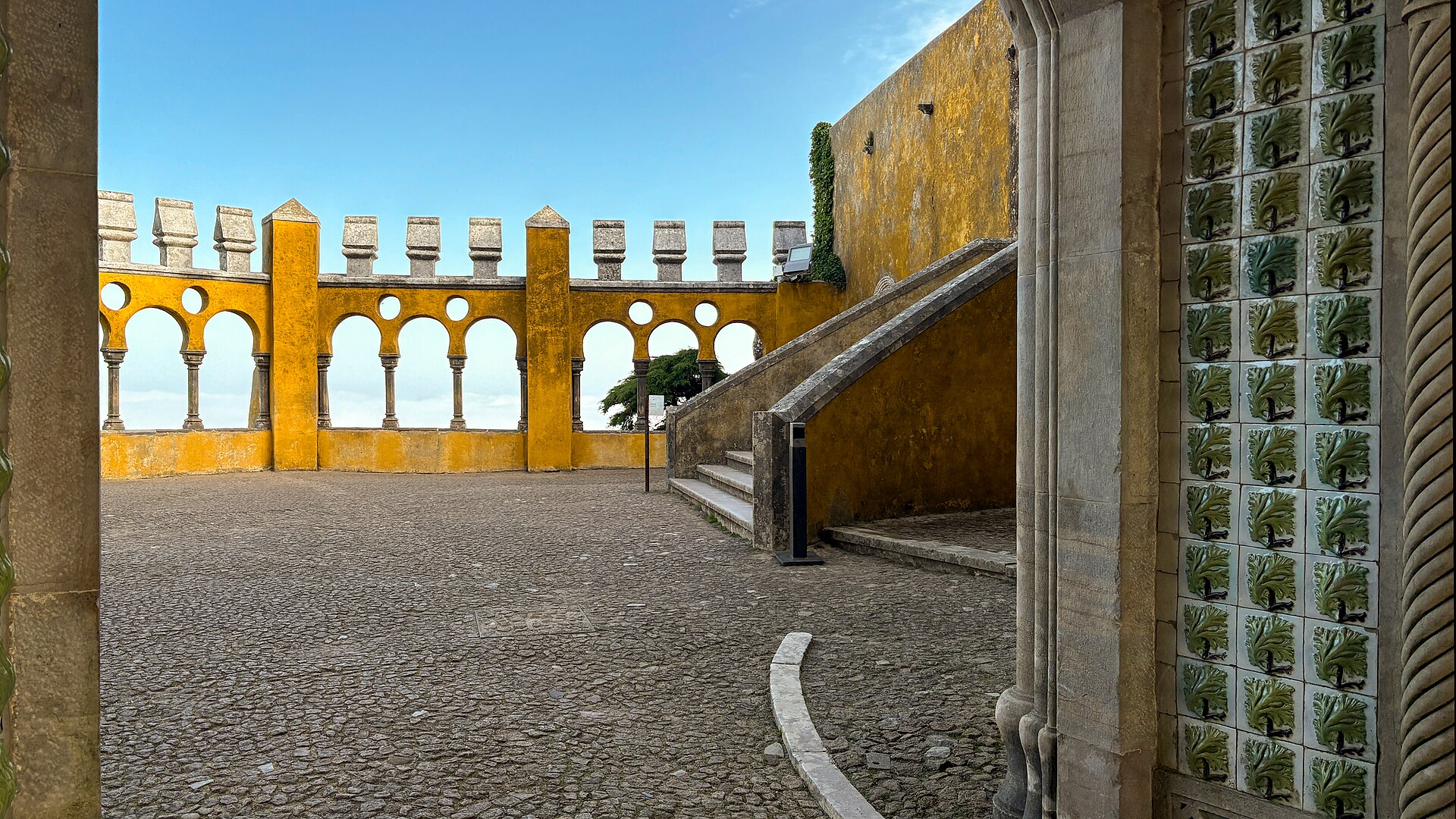Moorish-style arches and tilework in the palace