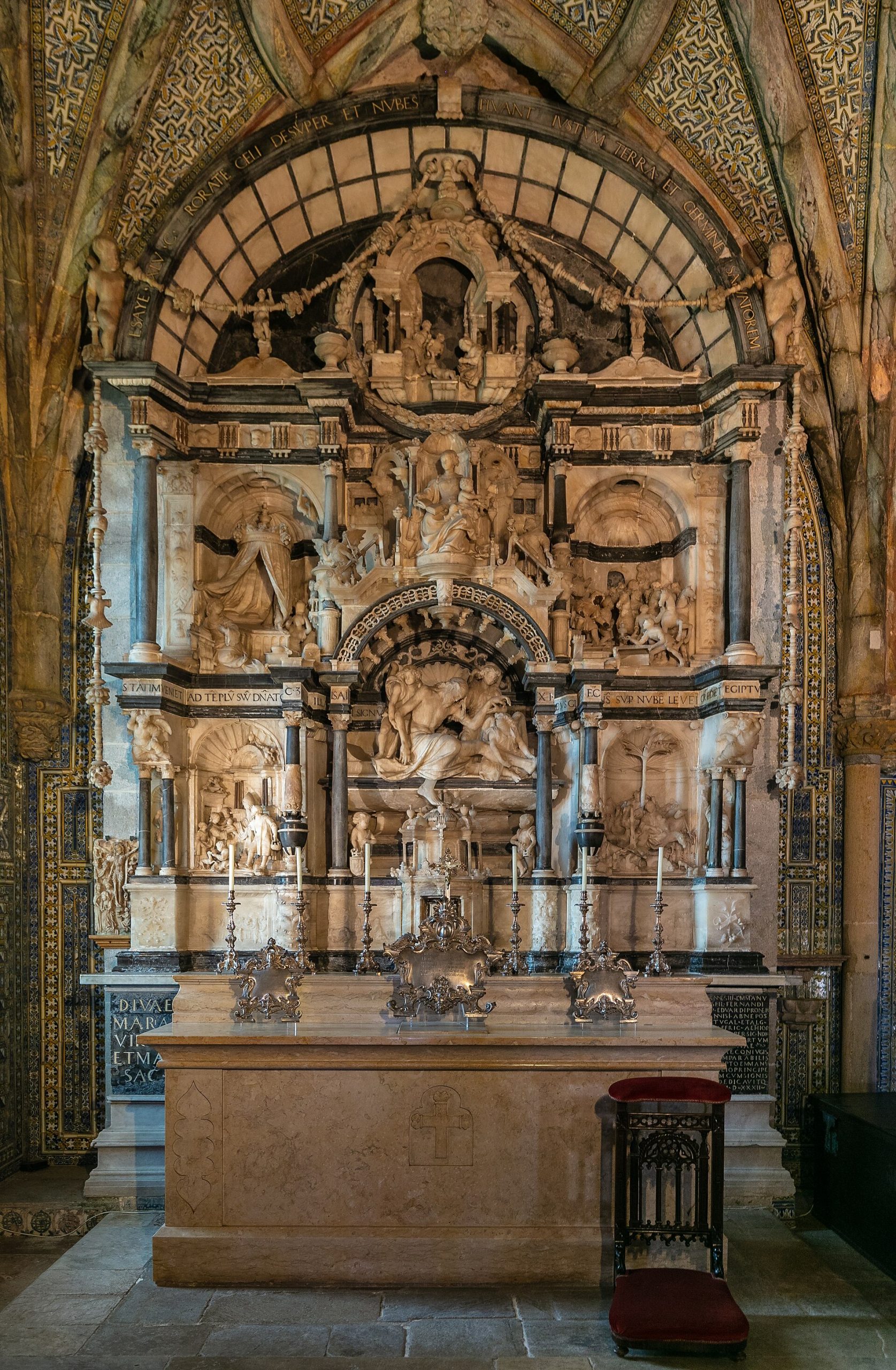 The palace rises above the forests and frequent mists of the Sintra hills.