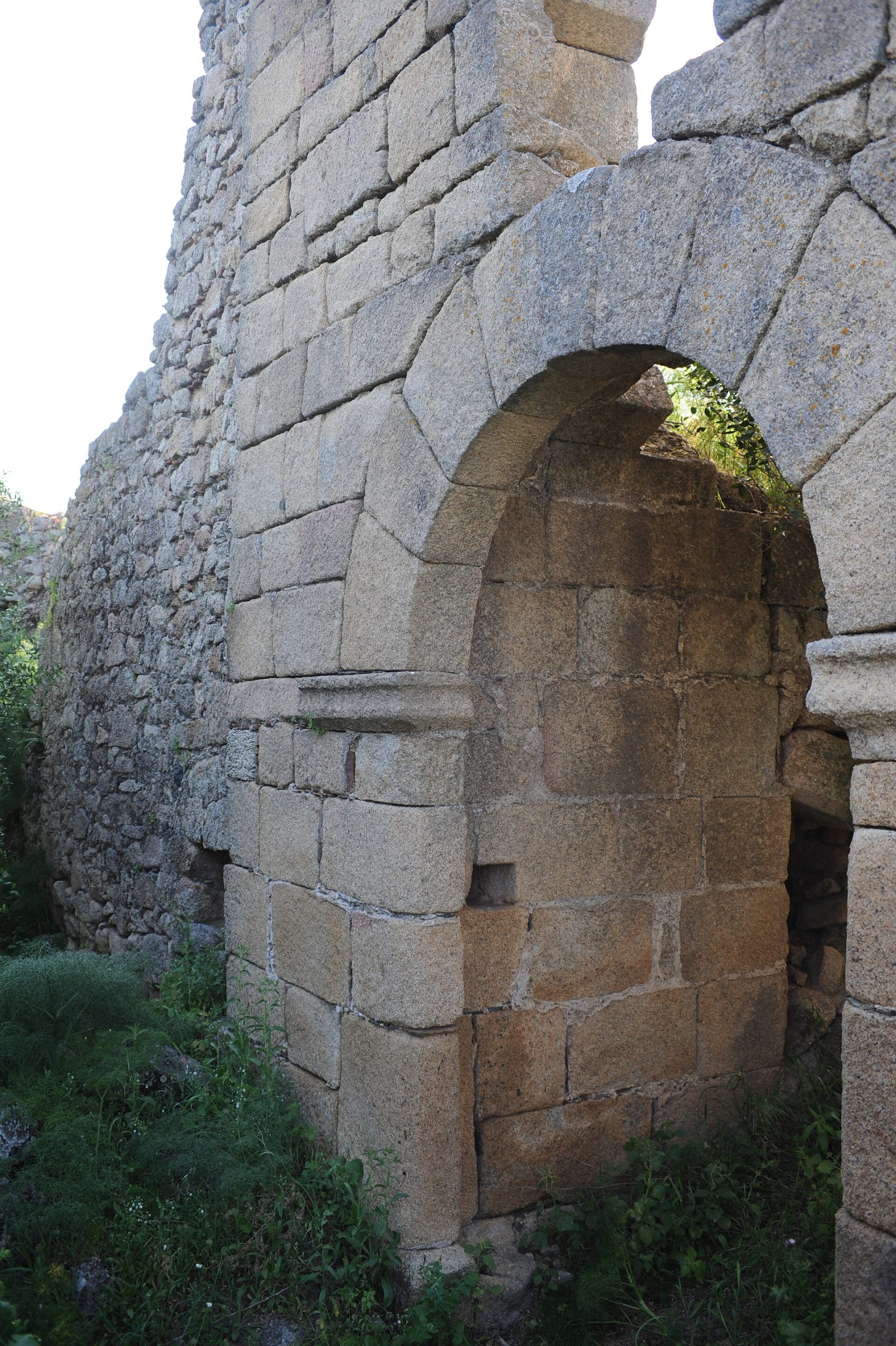 Passing through the gate, the visitor enters the long interior of the fortress.