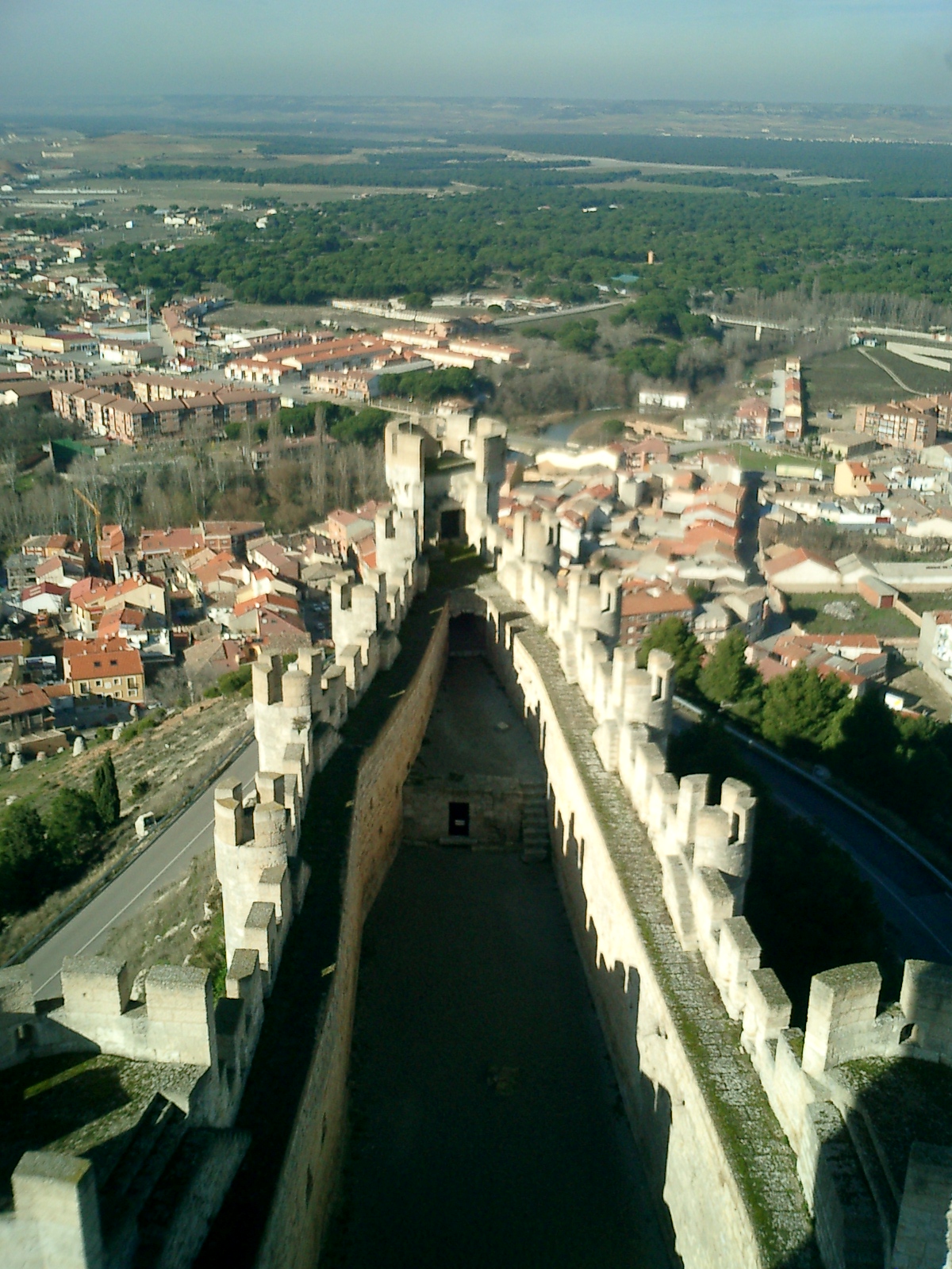 The castle crowns a long ridge above the town and the valleys of the Duero.