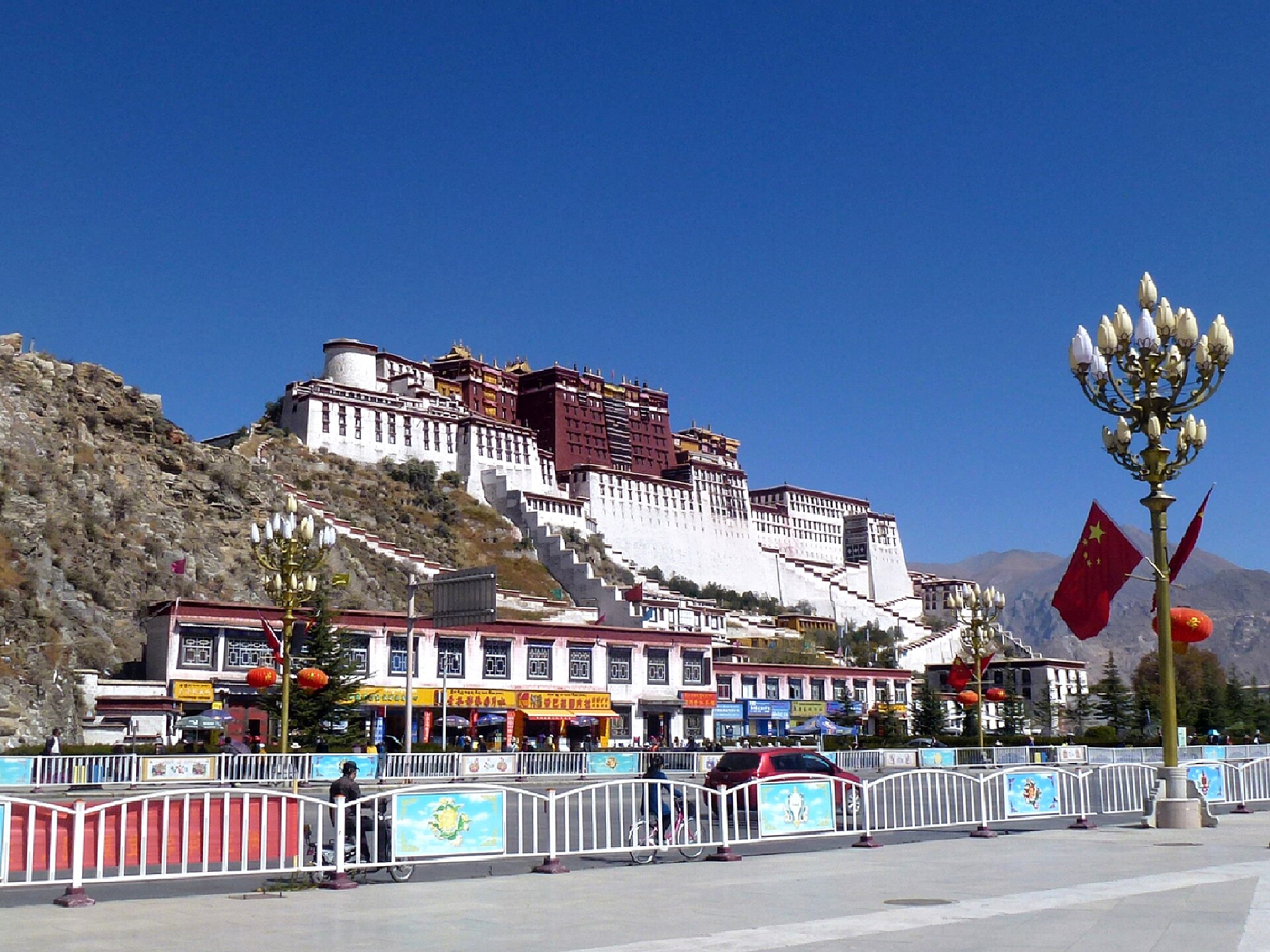 A detailed view of the Potala Palace, its walls sloping inward as they rise.
