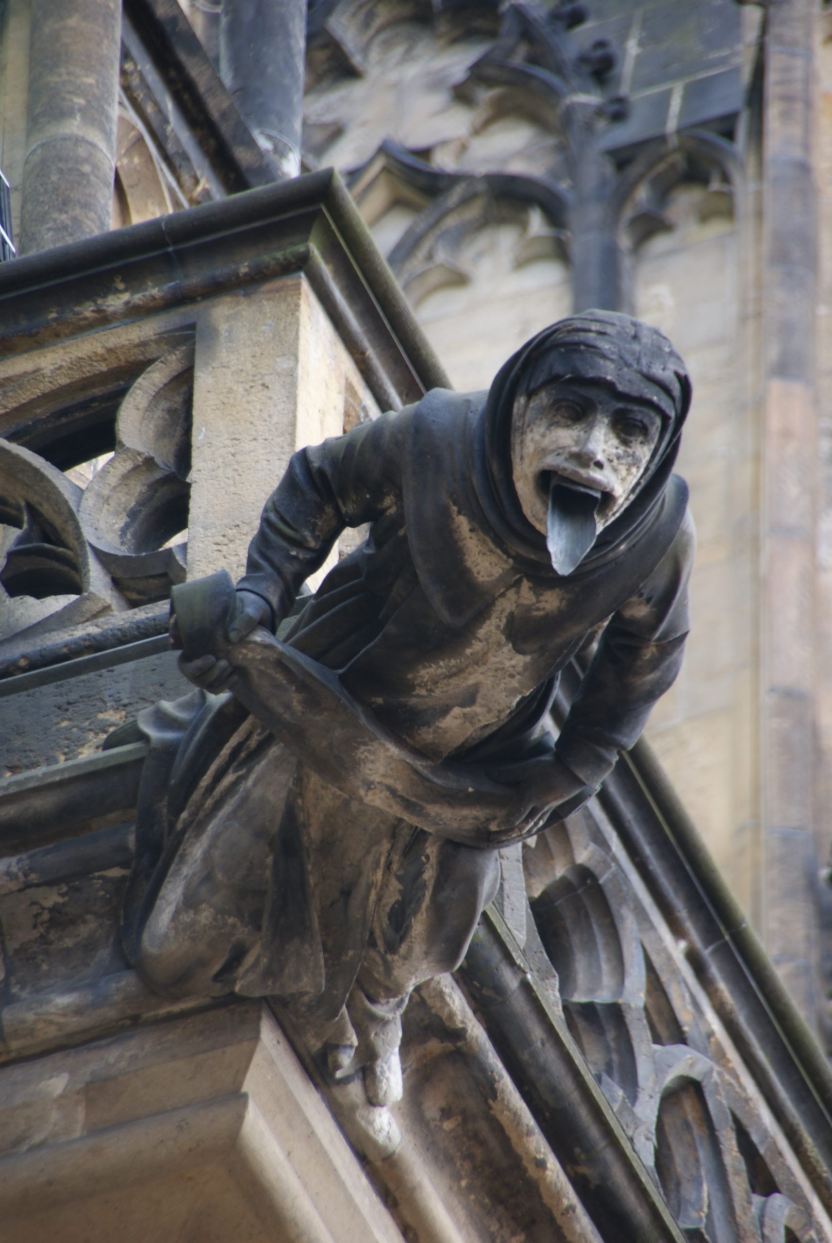 Gothic stonework and gargoyles keep watch over a castle that has seen its share of violence.