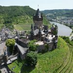 Reichsburg Cochem rising above the Moselle river