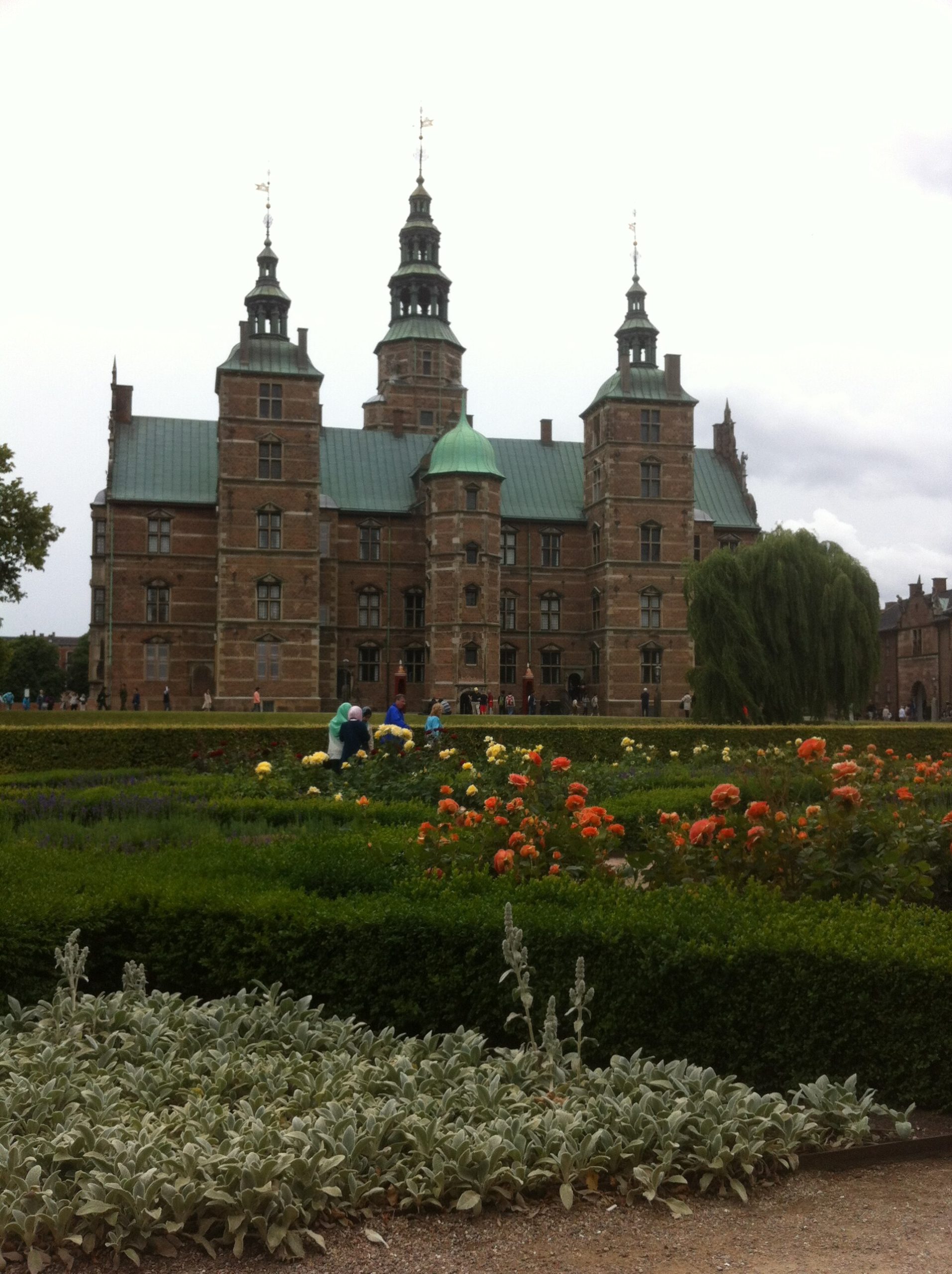 The clipped hedges and lawns of the castle garden