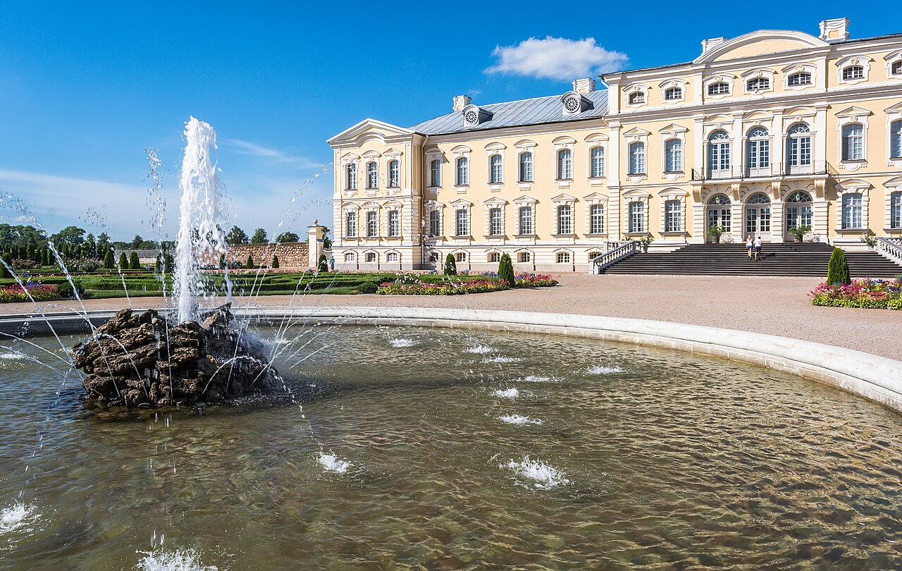 A fountain in the gardens before the palace.