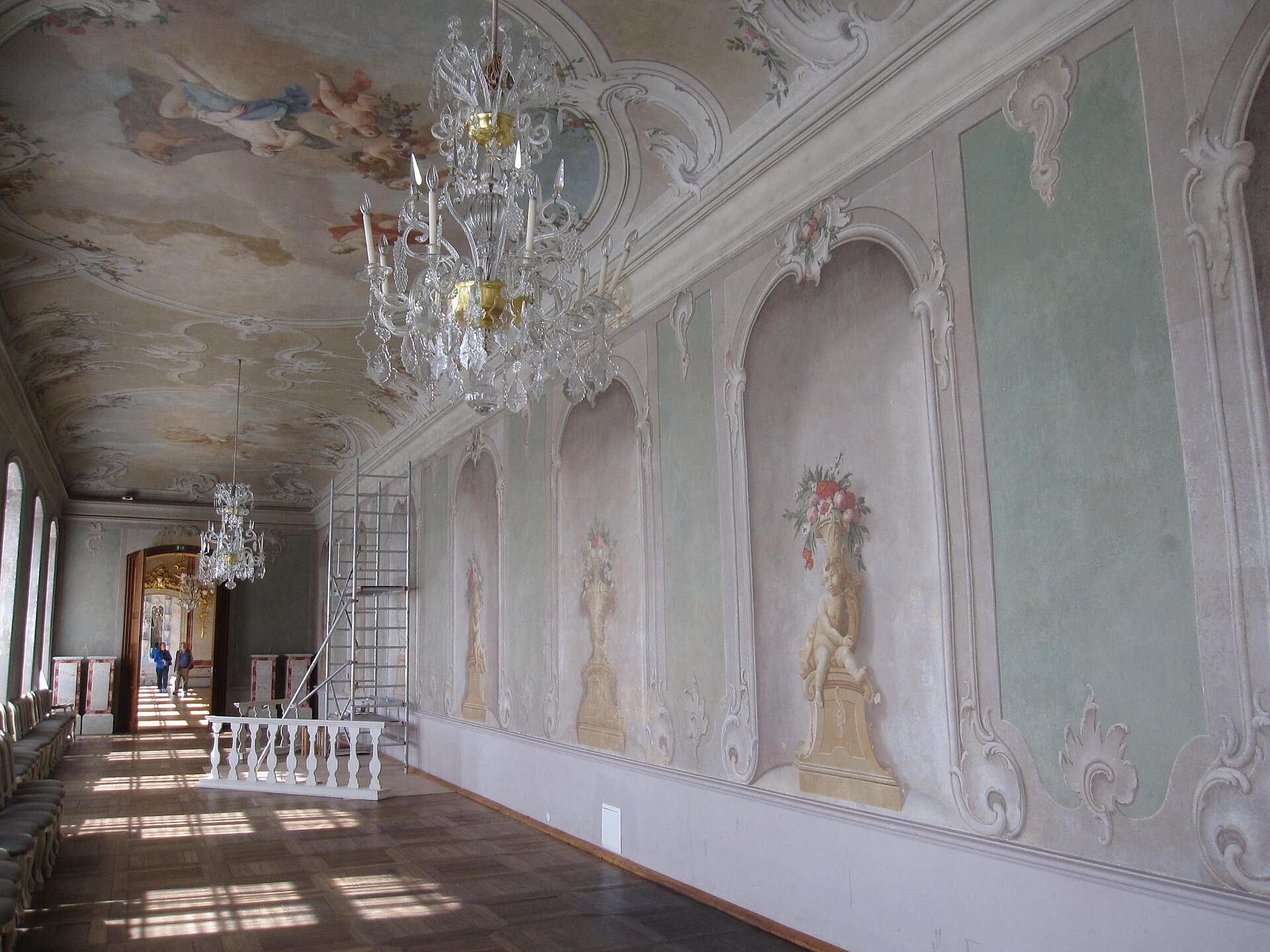 The richly decorated walls of a state room
