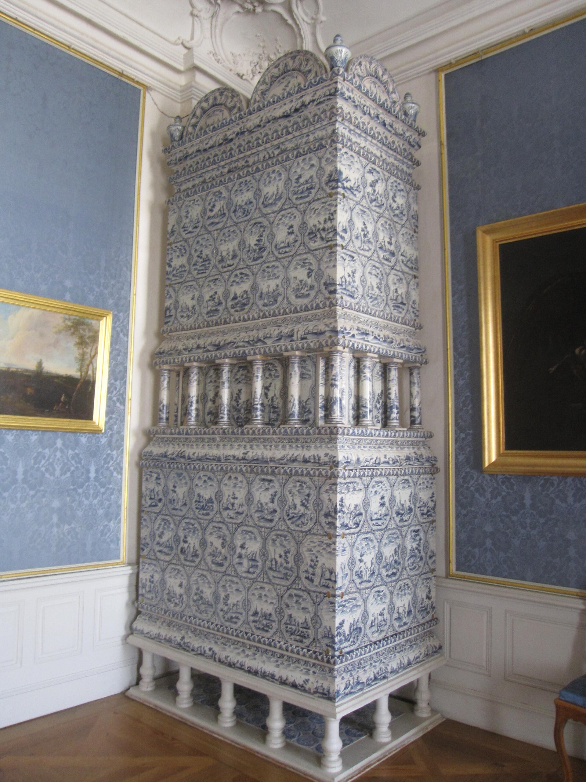 An ornate tiled stove in the palace interior