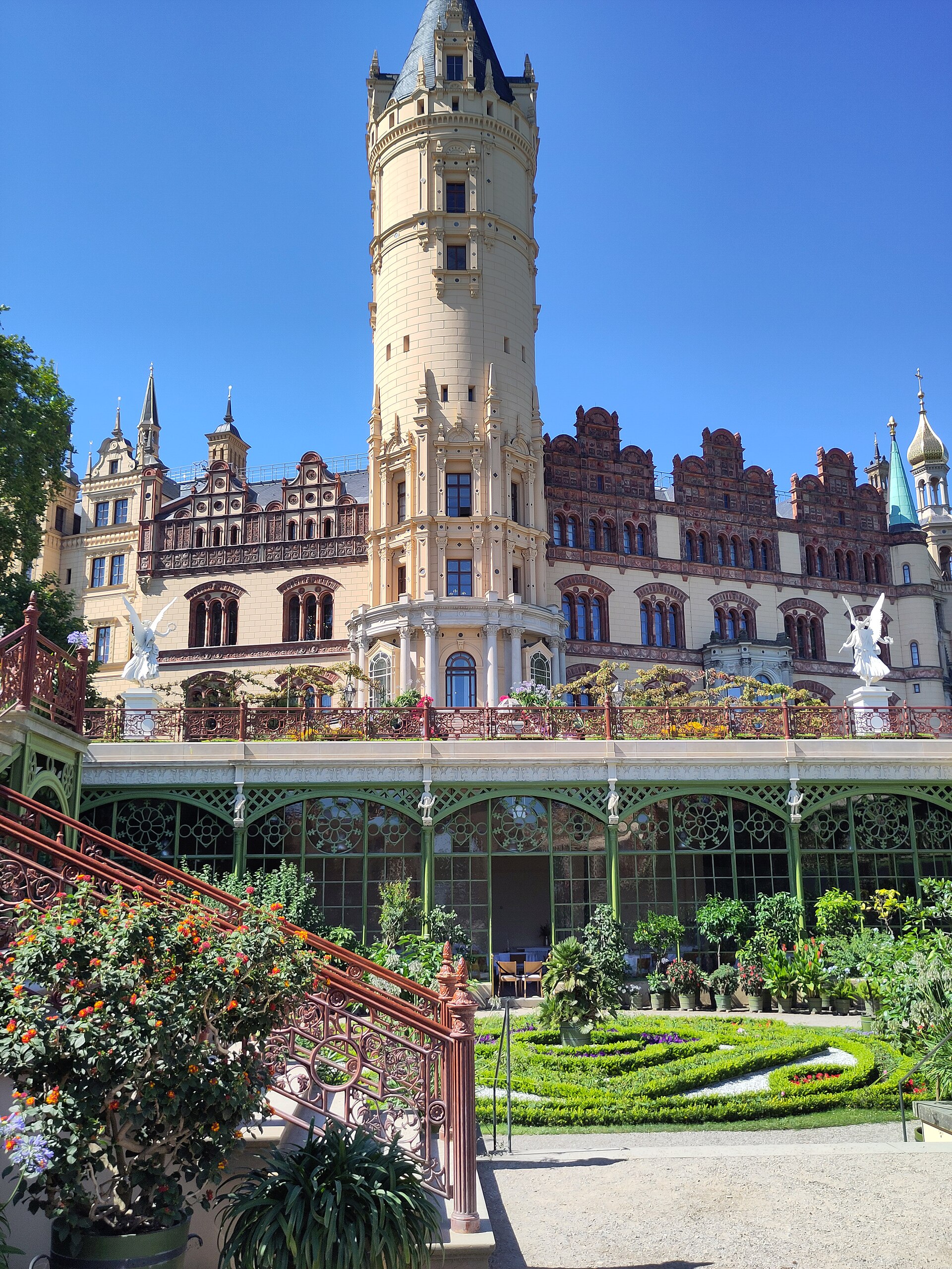 The castle and its orangery beside the water
