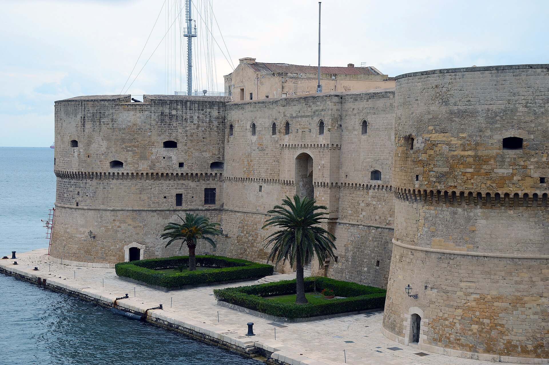 Beside the castle, a swing bridge opens to let ships pass between the two seas.