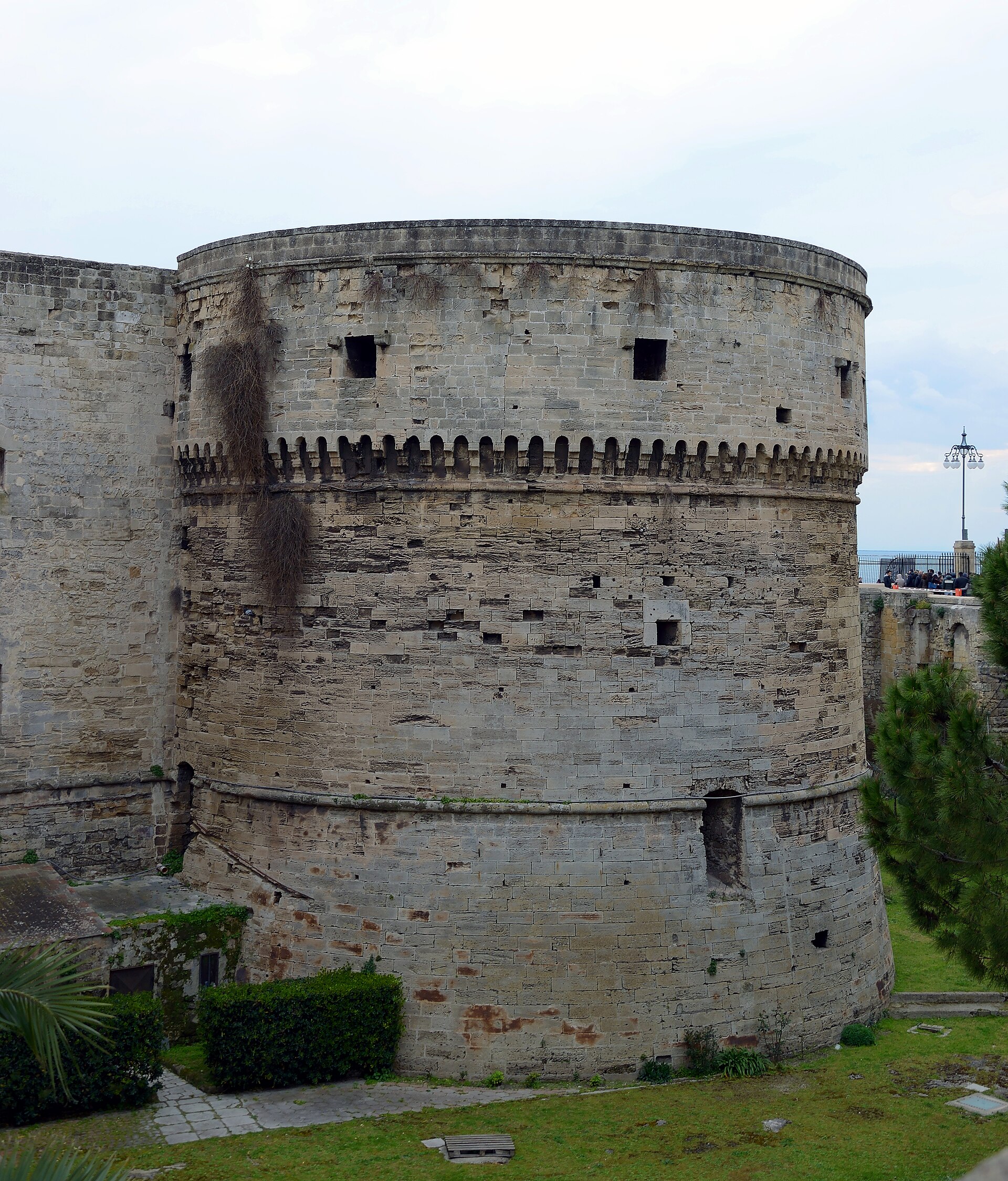 The castle's broad round towers were built massively thick to resist artillery.