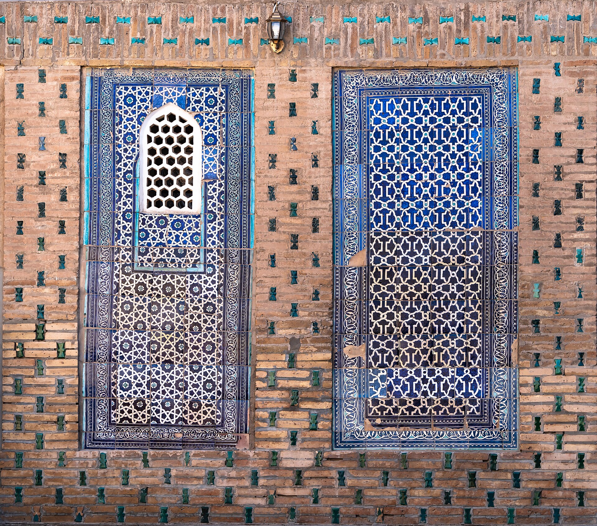 A wall of layered ornament in blue, white, and turquoise