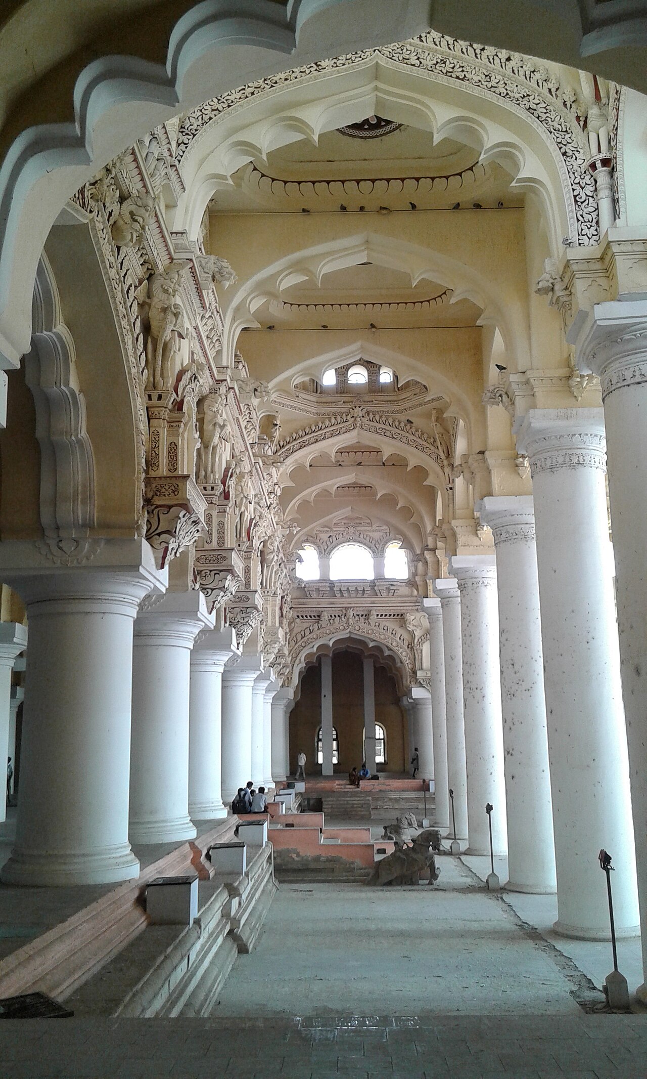 Ranks of giant pillars in the palace arcades.