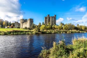 The castle in the low light of an Irish autumn, its walls and keep standing after eight centuries