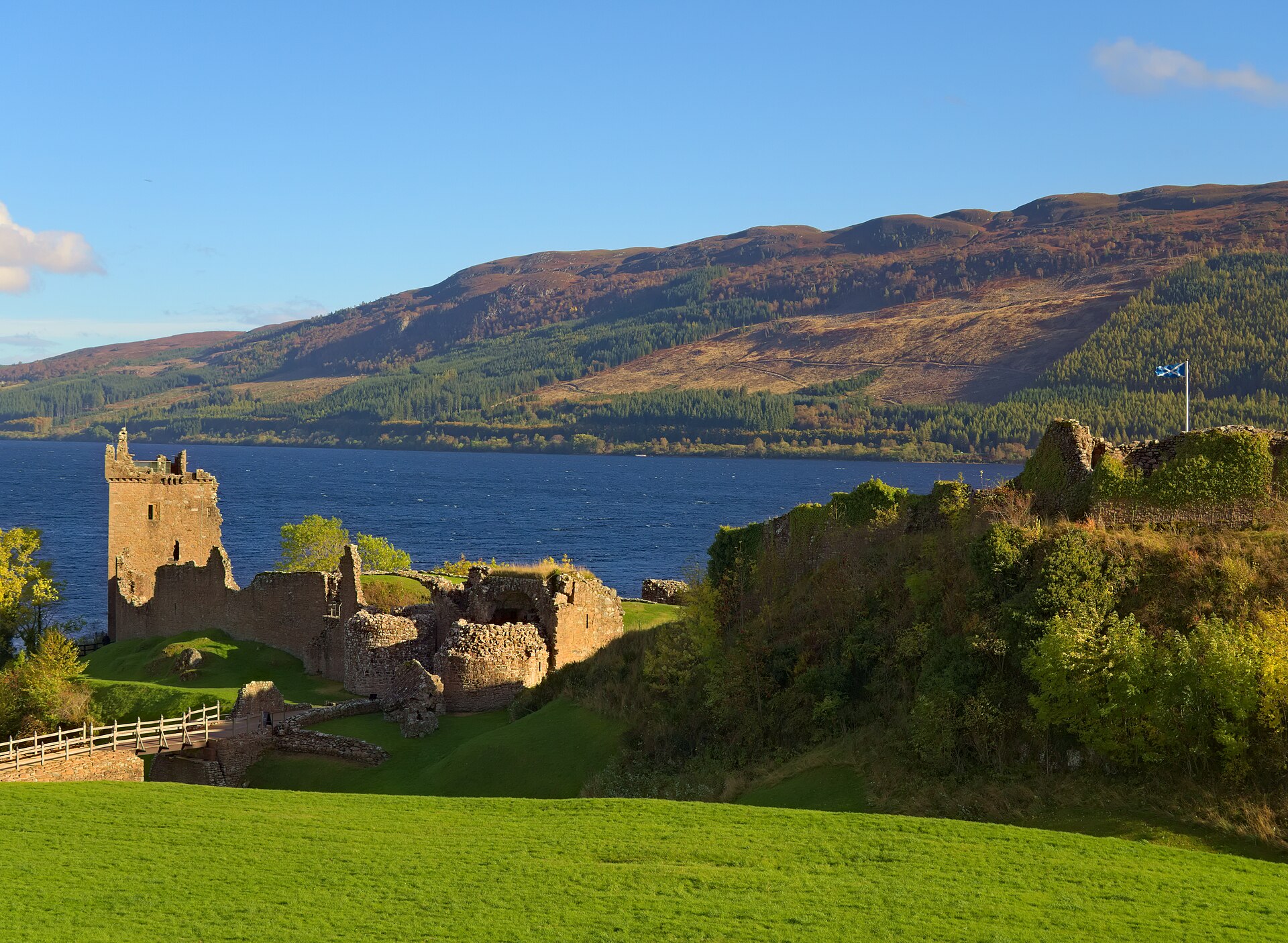 Urquhart's grey stone against the waters of Loch Ness, a classic Highland scene