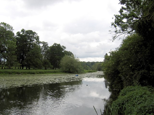 The Avon flowing beneath the castle, with its old mill and engine house on the bank