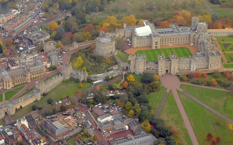 Windsor Castle from the air, the largest and oldest occupied castle in the world, spread along its ridge above the Thames