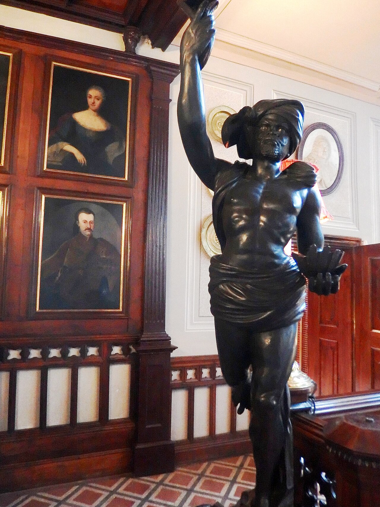 A richly furnished interior of the manor