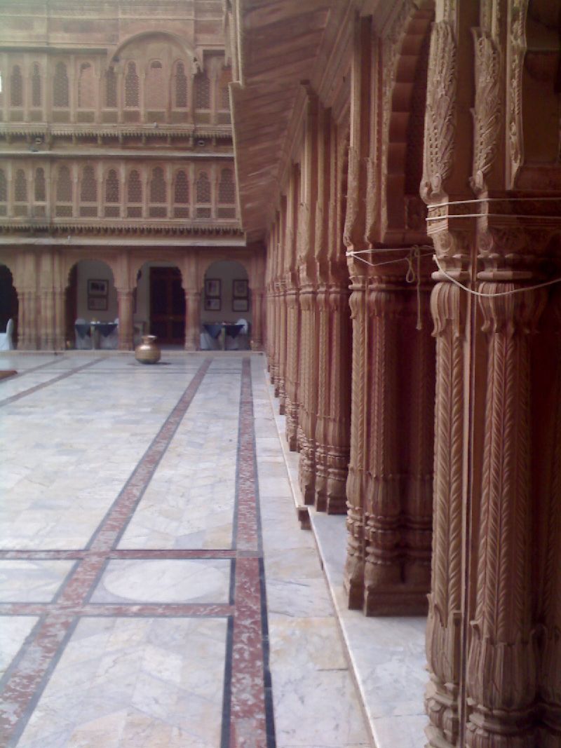Carved sandstone pillars of the palace
