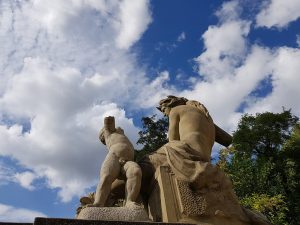 A statue by the lake