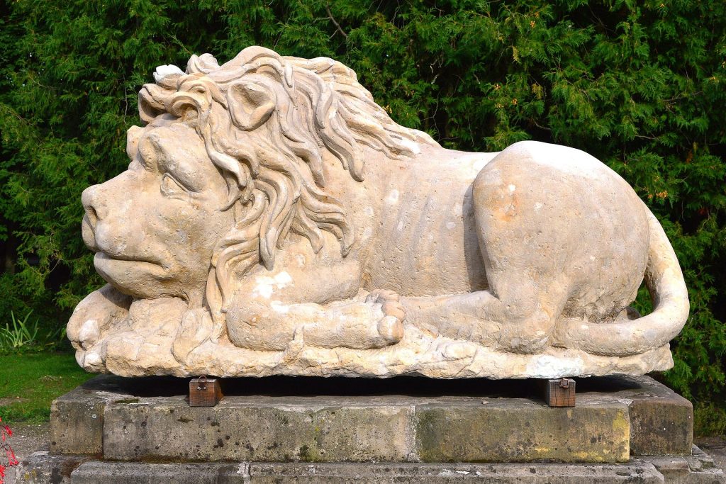 A stone lion in the gardens of Nieborow