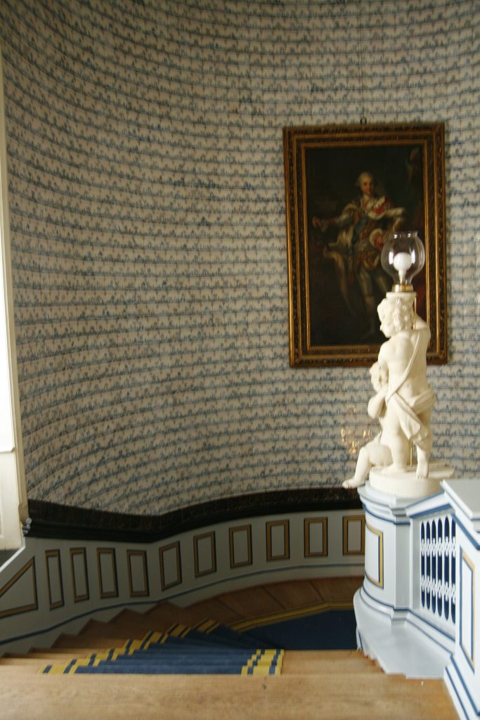 The main staircase lined with Dutch tiles