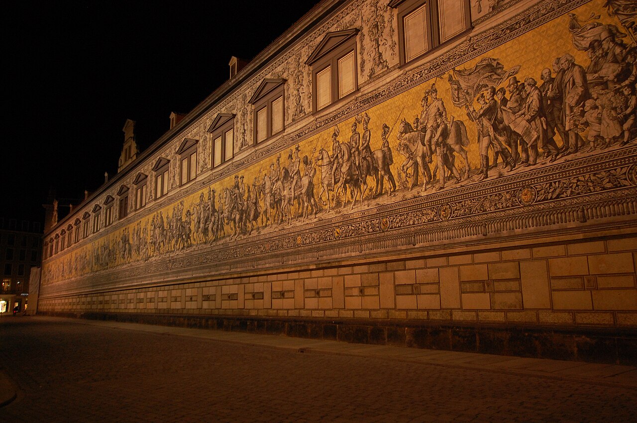 The Procession of Princes mural along the castle wall