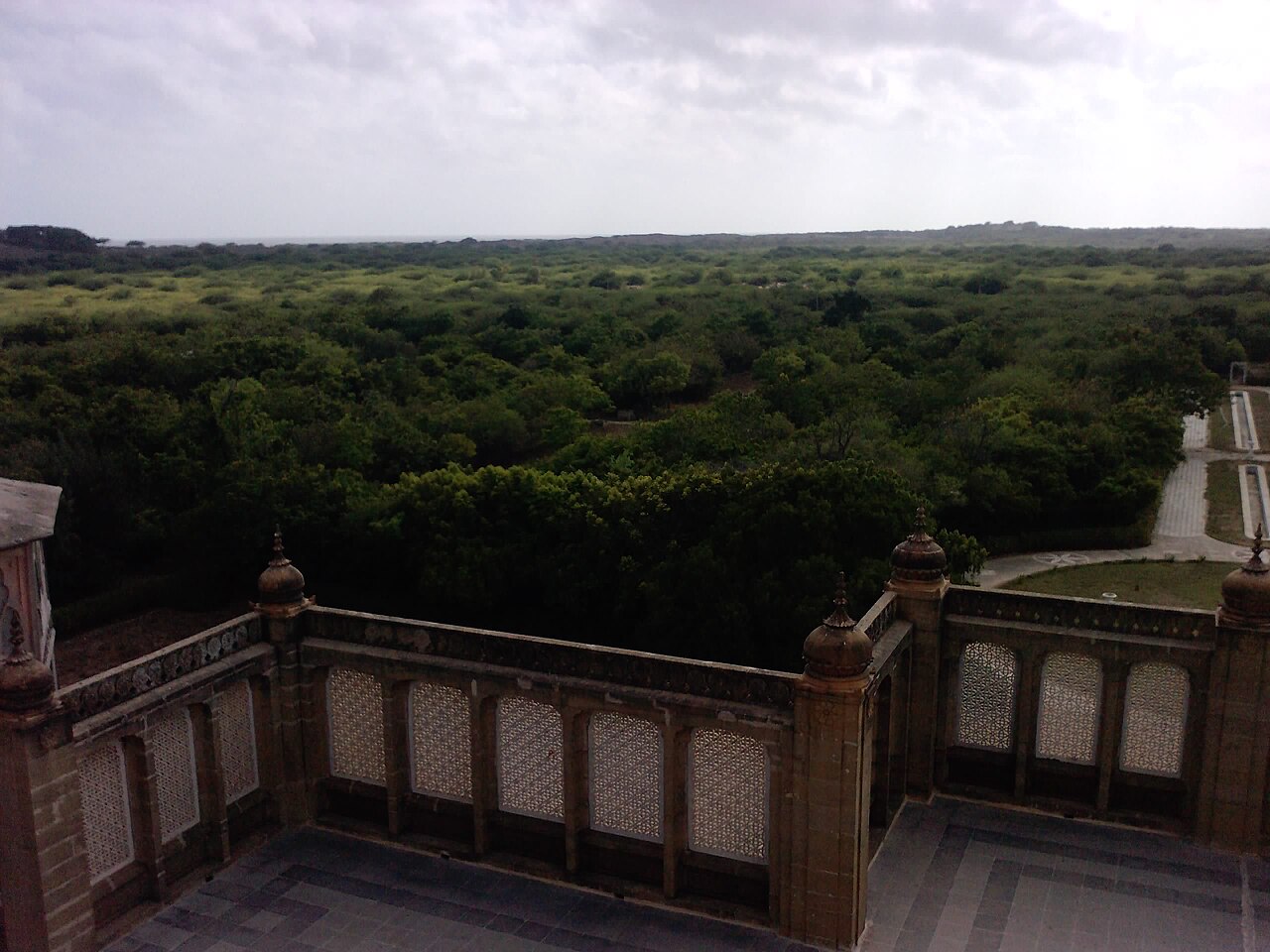 The carved balcony of the palace