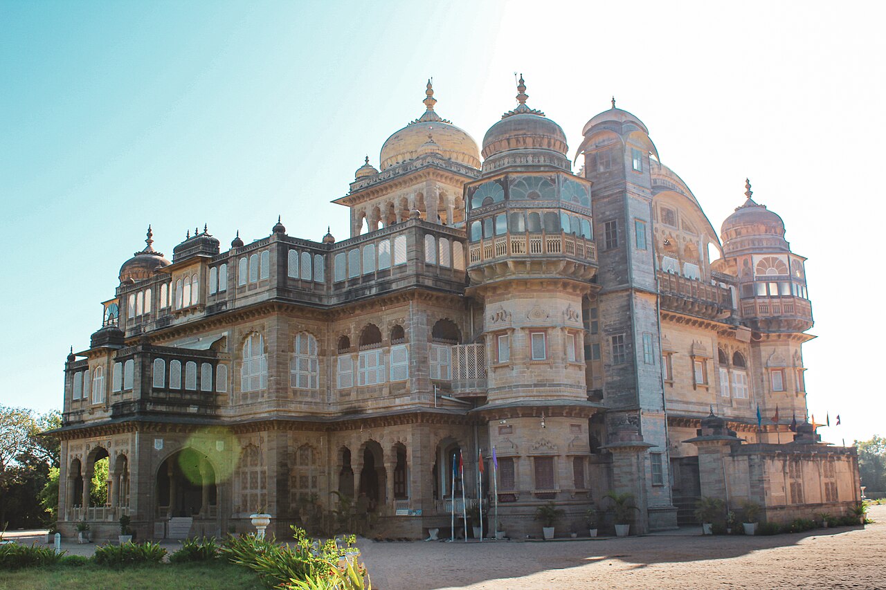 The red sandstone palace amid its gardens
