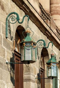 Historic wall lamps inside the palace